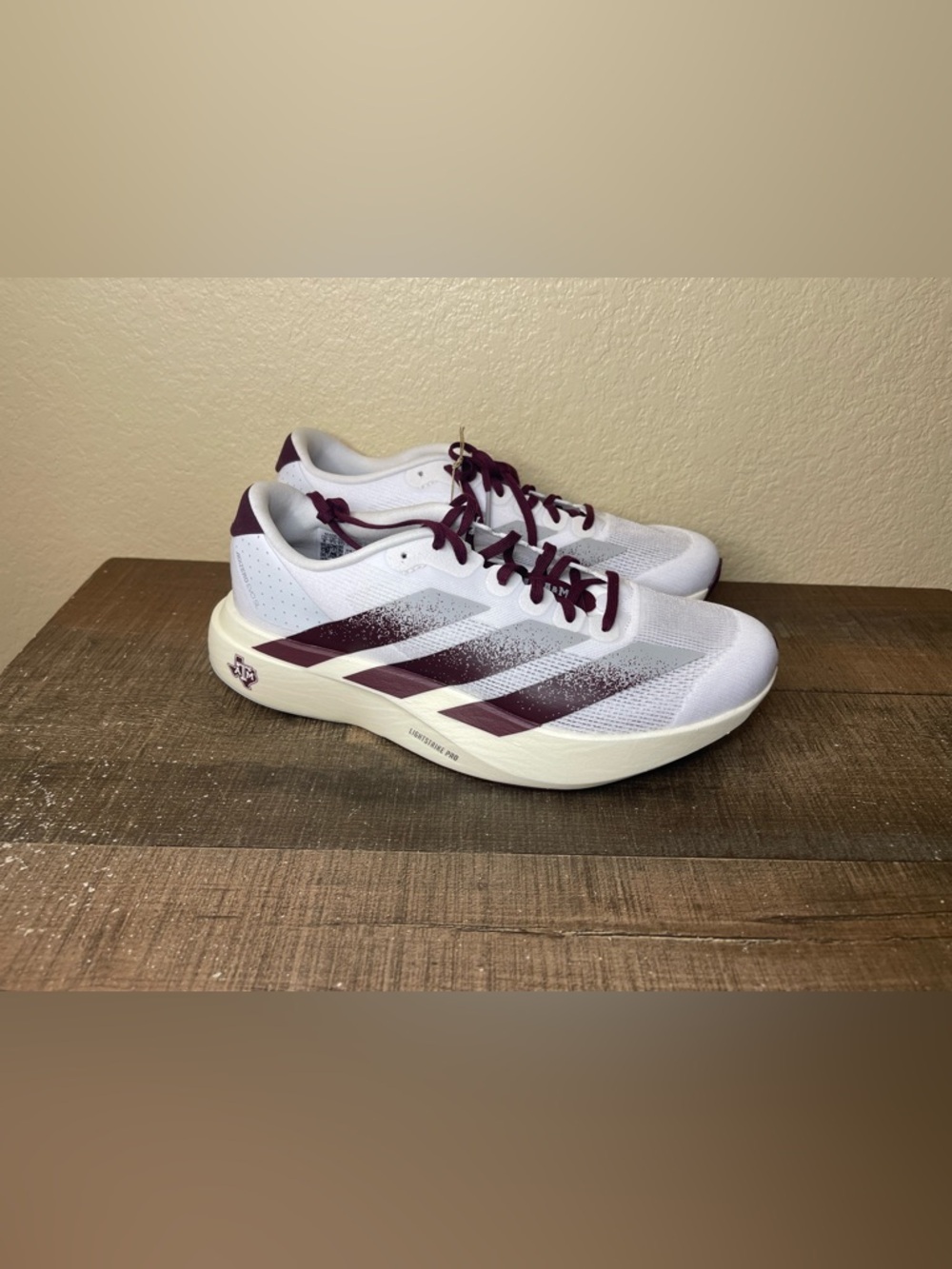 Adidas Adizero Evo SL NCAA “Texas A&M”
- Size 8 Men.